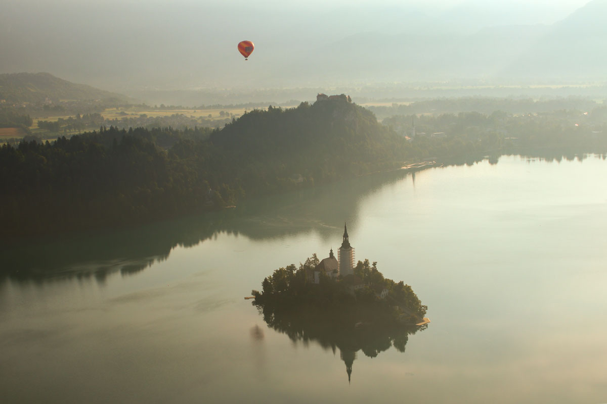 Early morning view from the Mala Osojnica viewpoint above the western side of Lake Bled.