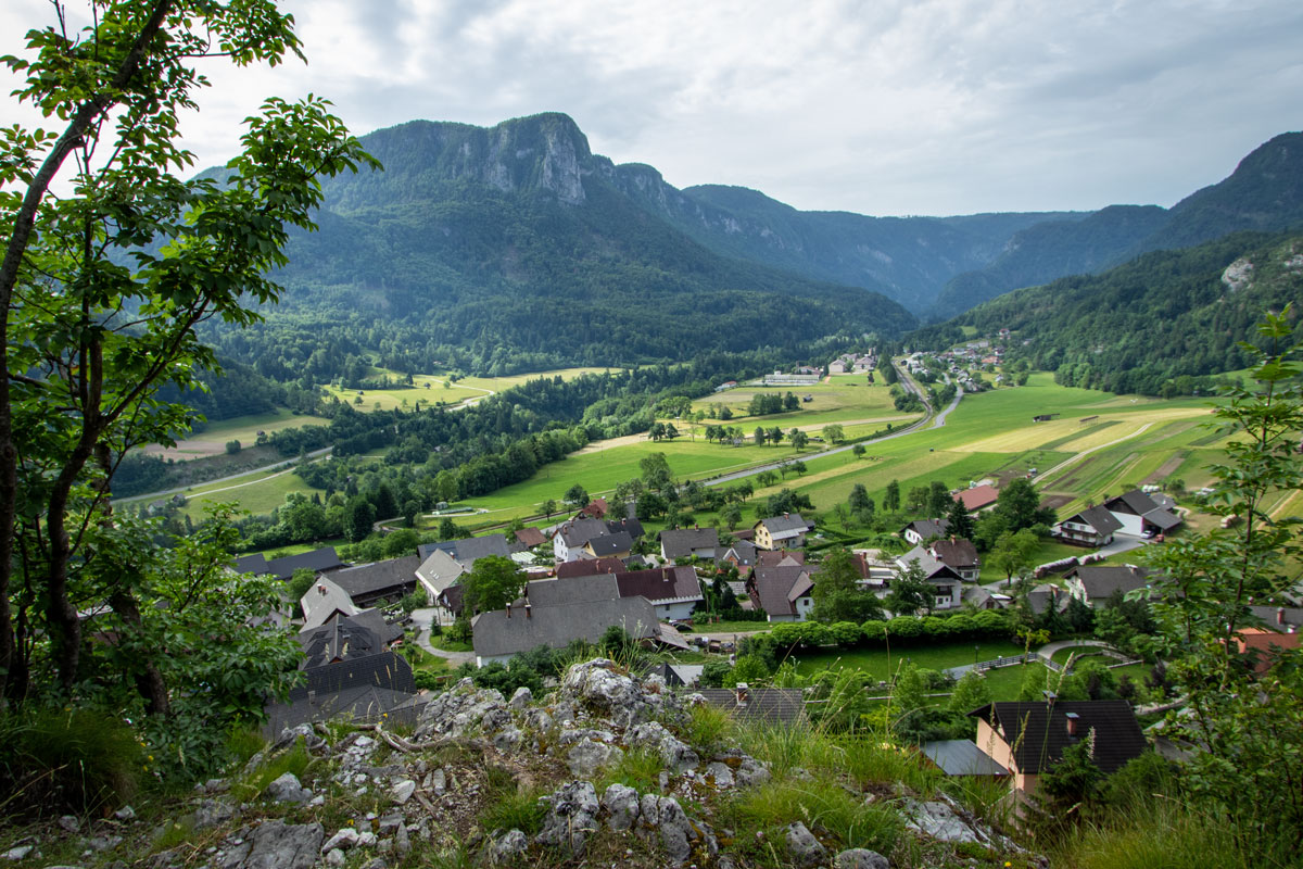 View from the top of Iglica Cliff towards the vilage of Bohinjska Bela below and Jelovica plateau in the distance. 