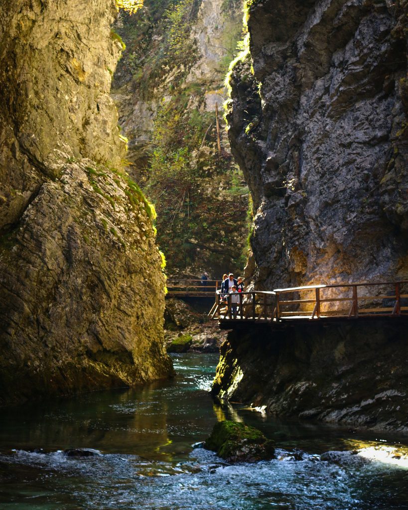 People walk through Vintgar Gorge.