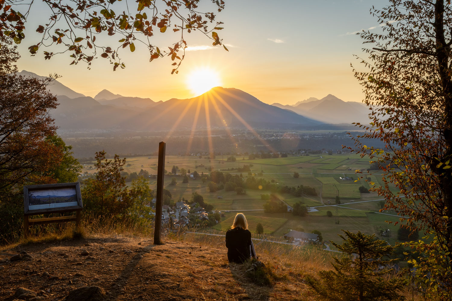 Dindol viewpoint on Straža Hill in Bled overlooking vast landscape with the mountains in the background